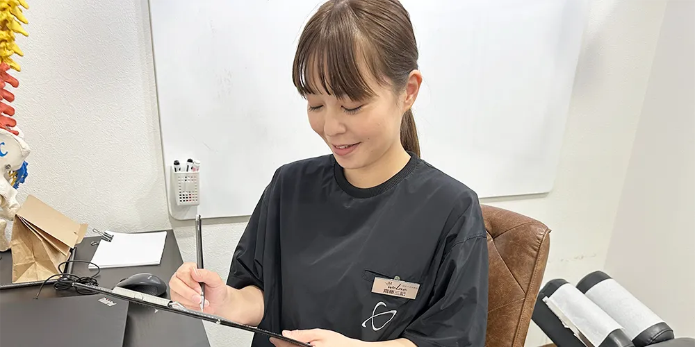 コースの提案をする整体師